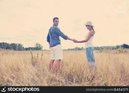 happy young couple have romantic time outdoor while smiling and hug