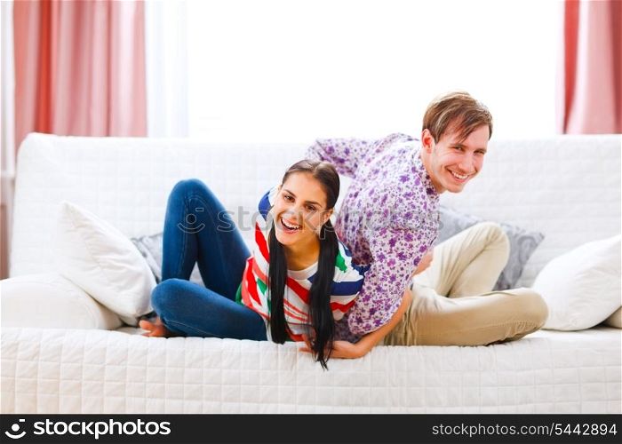 Happy young couple having fun at home&#xA;