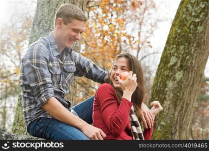 Happy young couple in forest