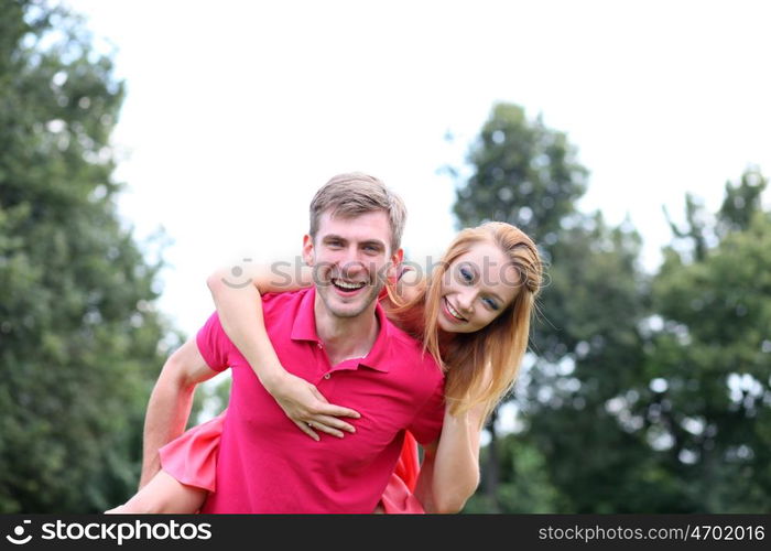 Happy young couple in love at the park