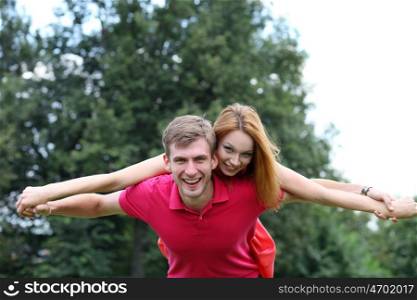 Happy young couple in love at the park