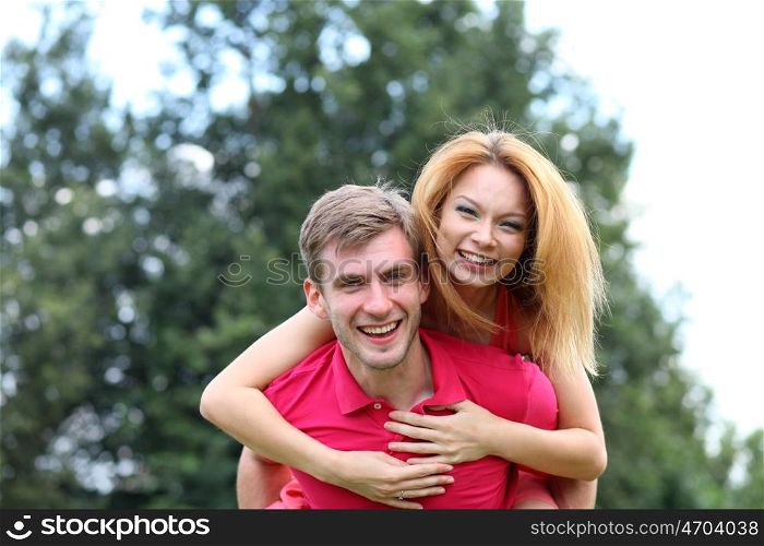 Happy young couple in love at the park
