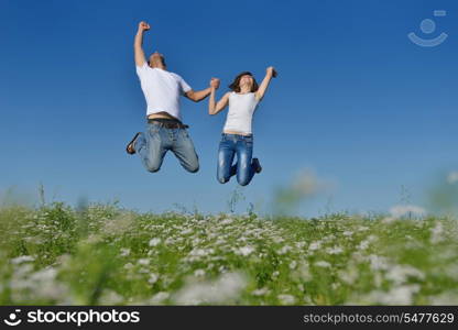 happy young couple in love have romance and fun at wheat field in summer