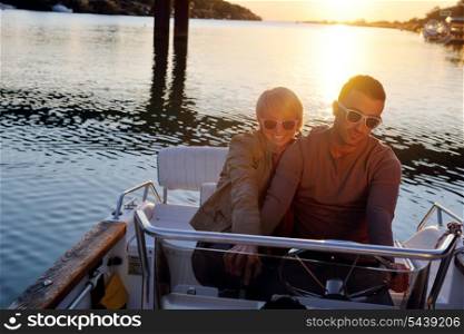 happy young couple in love have romantic time at summer sunset at ship boat while representing urban and countryside fashin lifestyle