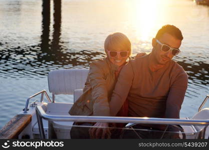 happy young couple in love have romantic time at summer sunset at ship boat while representing urban and countryside fashin lifestyle