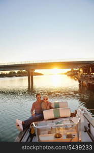 happy young couple in love have romantic time at summer sunset at ship boat while representing urban and countryside fashin lifestyle