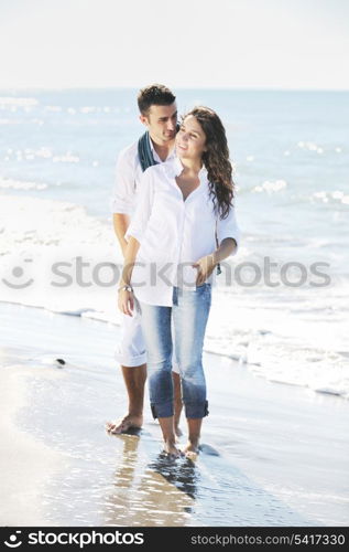 happy young couple in white clothing have romantic recreation and fun at beautiful beach on vacations