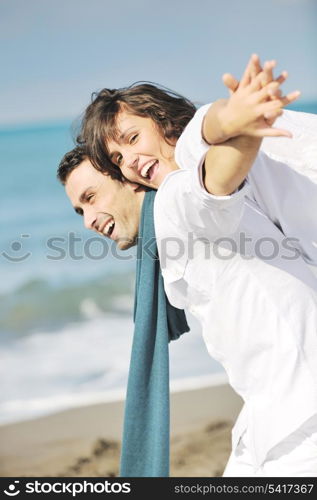 happy young couple in white clothing have romantic recreation and fun at beautiful beach on vacations