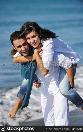 happy young couple in white clothing have romantic recreation and fun at beautiful beach on vacations