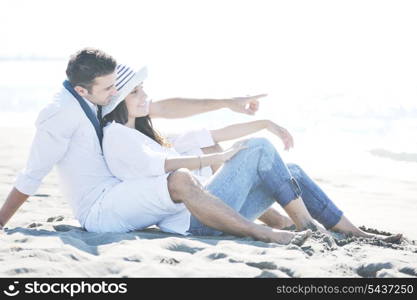 happy young couple in white clothing have romantic recreation and fun at beautiful beach on vacations