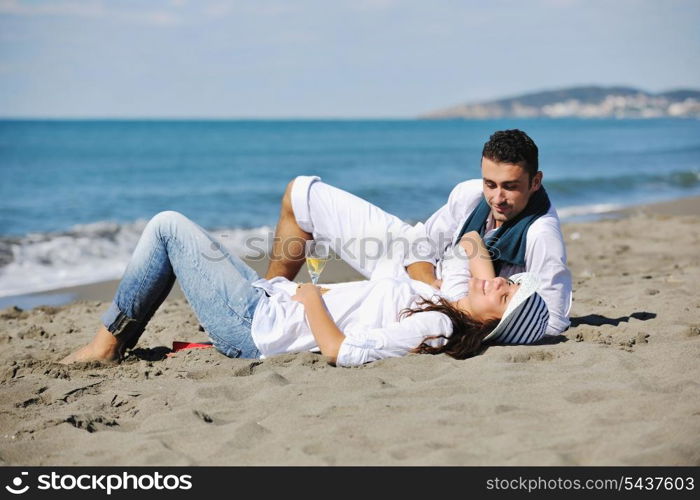 happy young couple in white clothing have romantic recreation and fun at beautiful beach on vacations