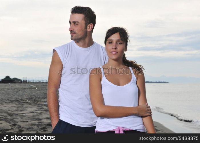 happy young couple in white clothing have romantic recreation and fun at beautiful beach on vacations