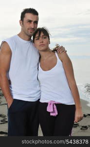 happy young couple in white clothing have romantic recreation and fun at beautiful beach on vacations