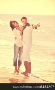 happy young couple in white clothing have romantic recreation and fun at beautiful beach on vacations