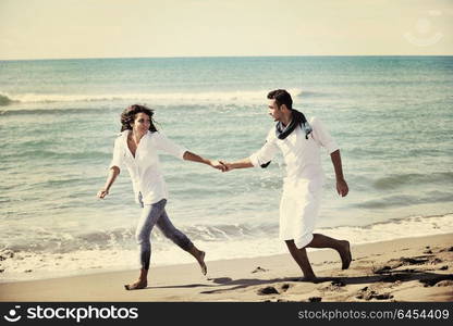 happy young couple in white clothing have romantic recreation and fun at beautiful beach on vacations