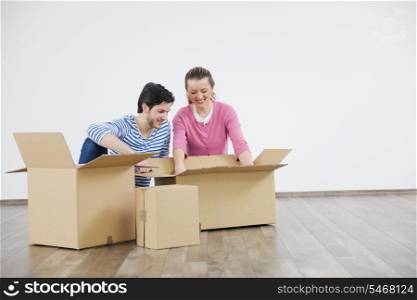 happy Young couple moving in new home