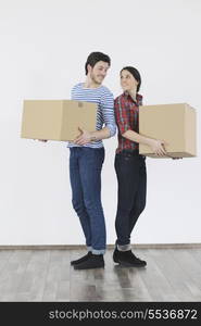 happy Young couple moving in new home