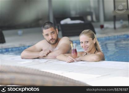 happy young couple on wellness and spa beauty treatment in bath and bed