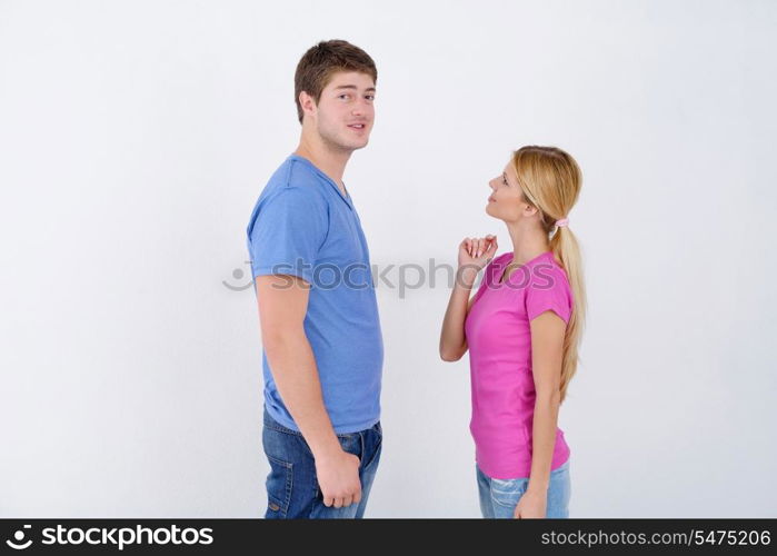 happy young couple paint in green and blue color white wall of their new home