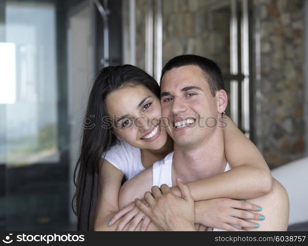 happy young couple relax and have fun in bed