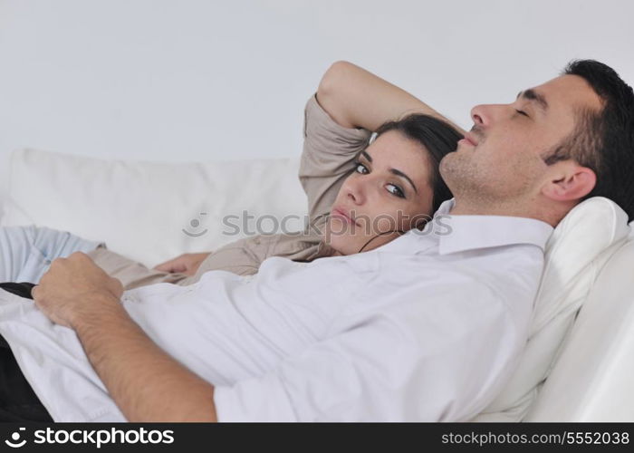 happy young couple relax at modern home living room indoor