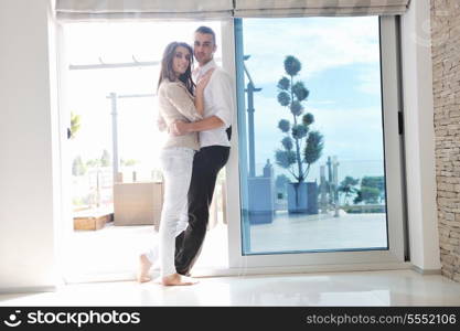 happy young couple relax at modern home living room indoor