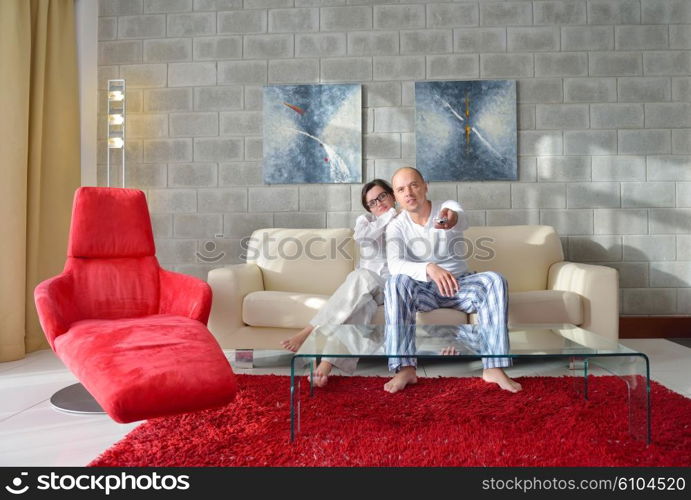 happy young couple relax at modern home living room indoor