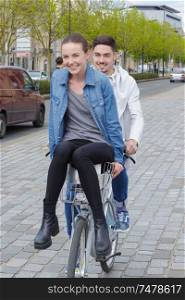 happy young couple with bike