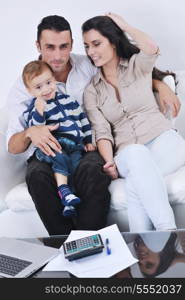 happy young family have fun and relaxing at new home with bright furniture