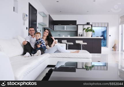 happy young family have fun and relaxing at new home with bright furniture