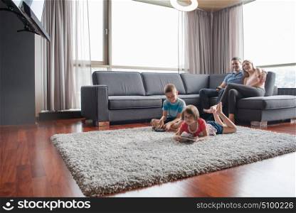 Happy Young Family Playing Together at home