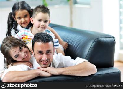 happy young family relax and have fun at modern home indooor