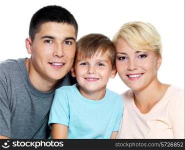 Happy young family with son of 6 years posing over white background