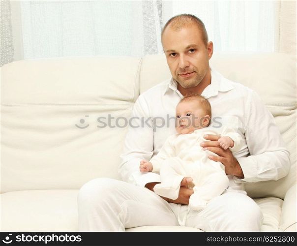 Happy young father with a kid