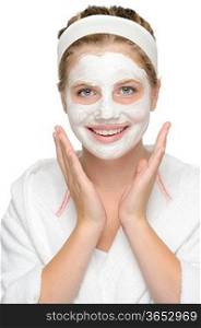 Happy young girl face mask smiling cosmetics cleaning cream