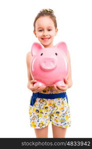 Happy young girl with a new piggy bank to start her savings