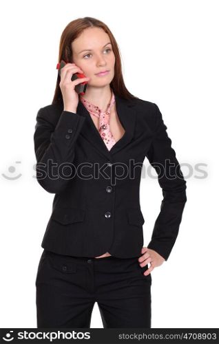 Happy young lady talking on mobile phone