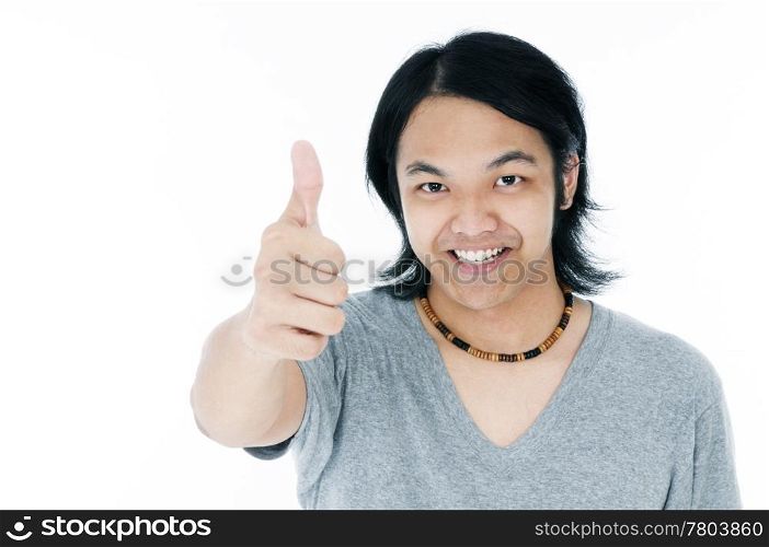 Happy young man giving thumb up gesture