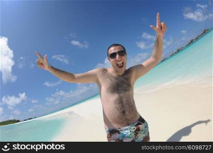 happy young man have fun and relax on beach