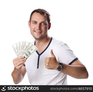 Happy young man holding a pile of cash isolated on white background