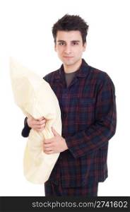 happy young man in pajamas holding pillow isolated on white background