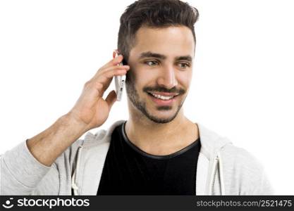 Happy young man talking on cell phone isolated on white background
