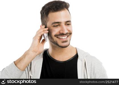 Happy young man talking on cell phone isolated on white background