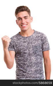 Happy young man with closed fist celebrating