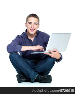 Happy young man with laptop - isolated on white