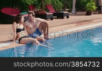 Happy young people, fun, leisure, lifestyle, vacations and relax near resort swimming pool, portrait of boyfriend and girlfriend looking at camera. 10of27