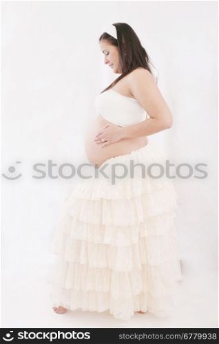Happy young pregnant woman