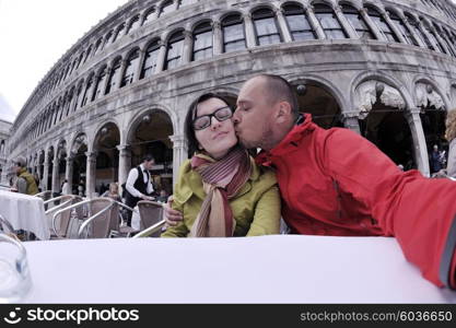 happy young romantic couple in love travel and have fun in venice