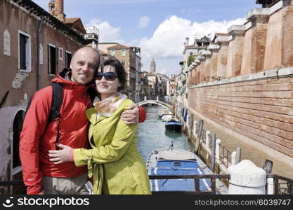 happy young romantic couple in love travel and have fun in venice