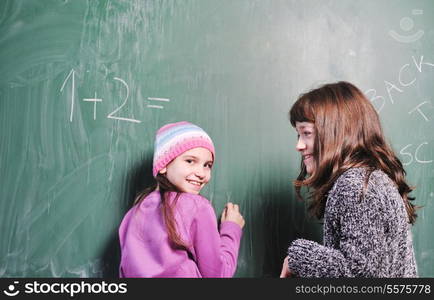 happy young school girl portrait on math class